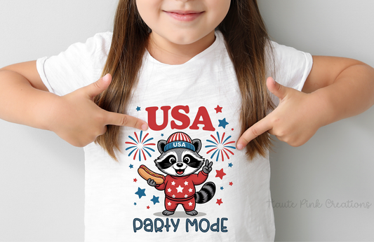 USA Party Mode On Kids Tee – Cute Patriotic Raccoon Graphic on Youth Bella + Canvas Shirt
