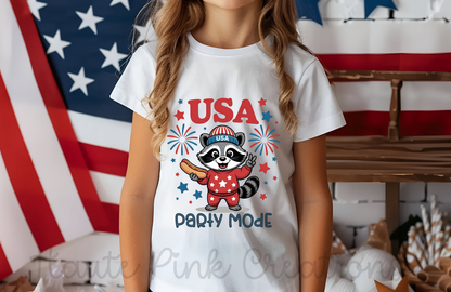 USA Party Mode On Kids Tee – Cute Patriotic Raccoon Graphic on Youth Bella + Canvas Shirt