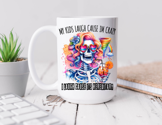 Funny Mom Mug – 15 oz Ceramic Coffee Cup, Colorful Skeleton, “My Kids Laugh Because I’m Crazy” Sublimated